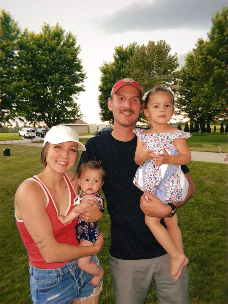 Family photo in the park on the Fourth of July